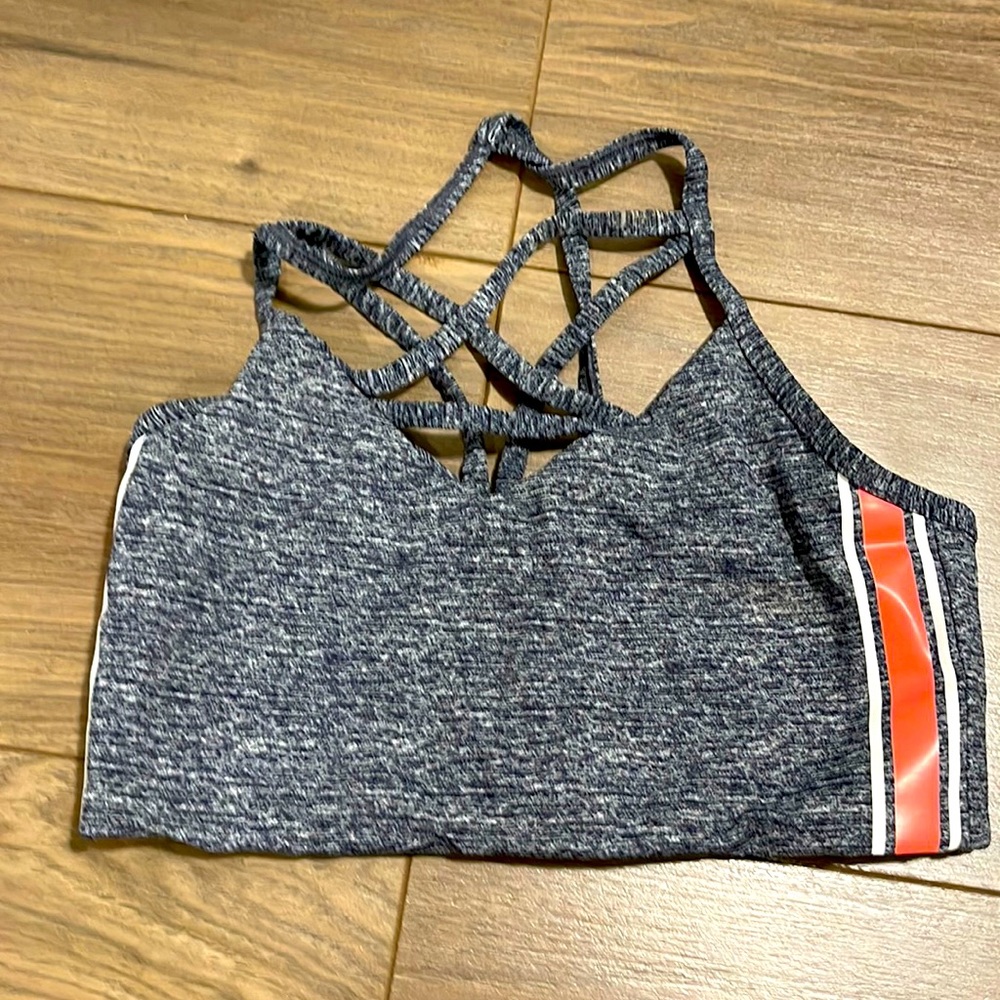 Pink Victoria’s Secret sports bra